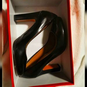 Brand new never worn coach heels